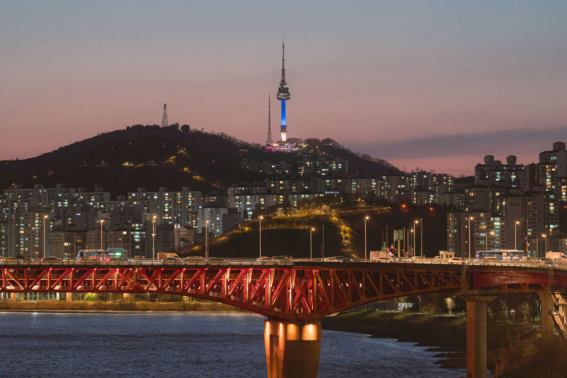 Namsan Tower above Seoul at dusk across the Han River